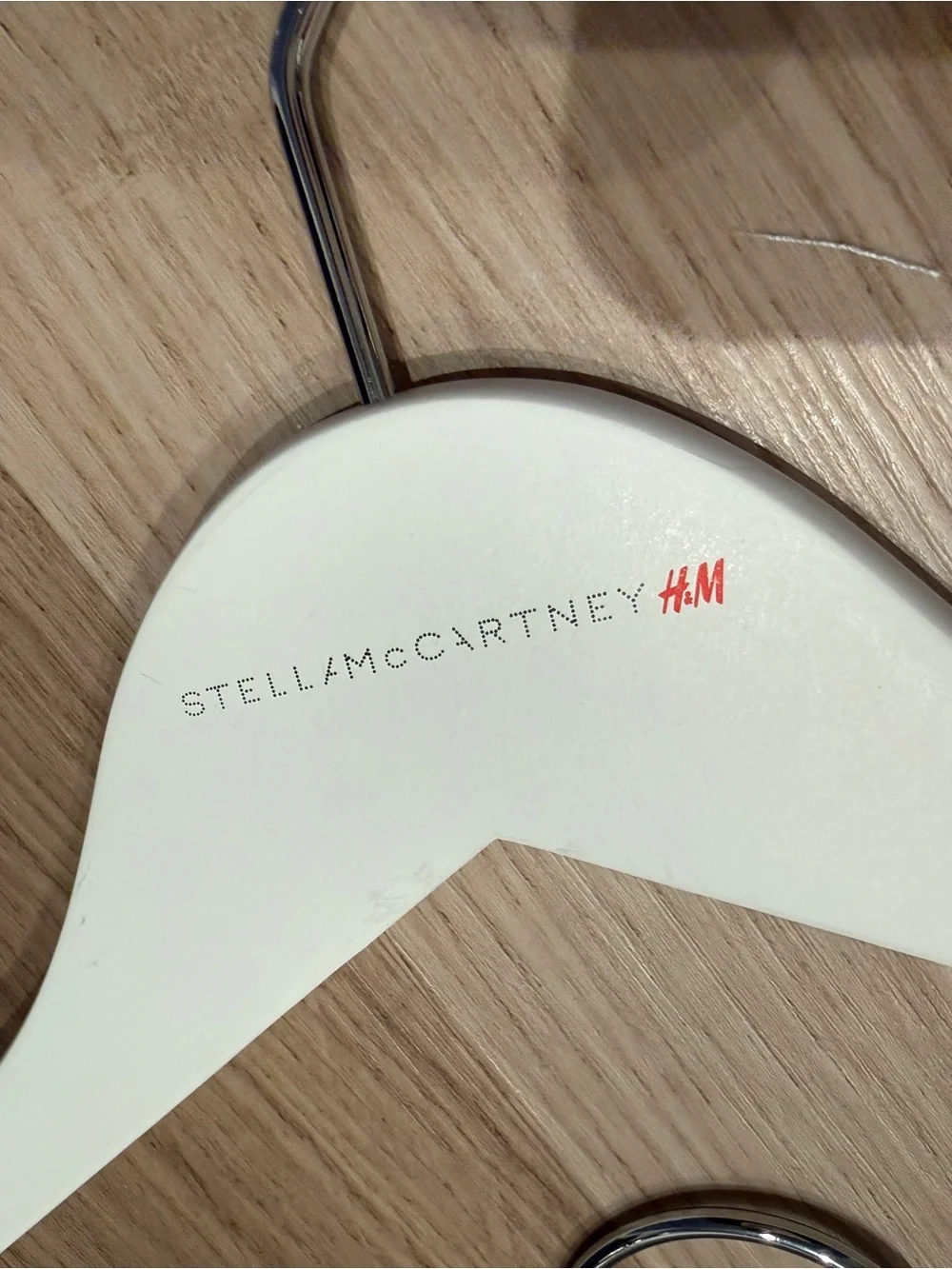 Stella McCartney H&M White Branded Shopping Bag with White Wooden Hangers